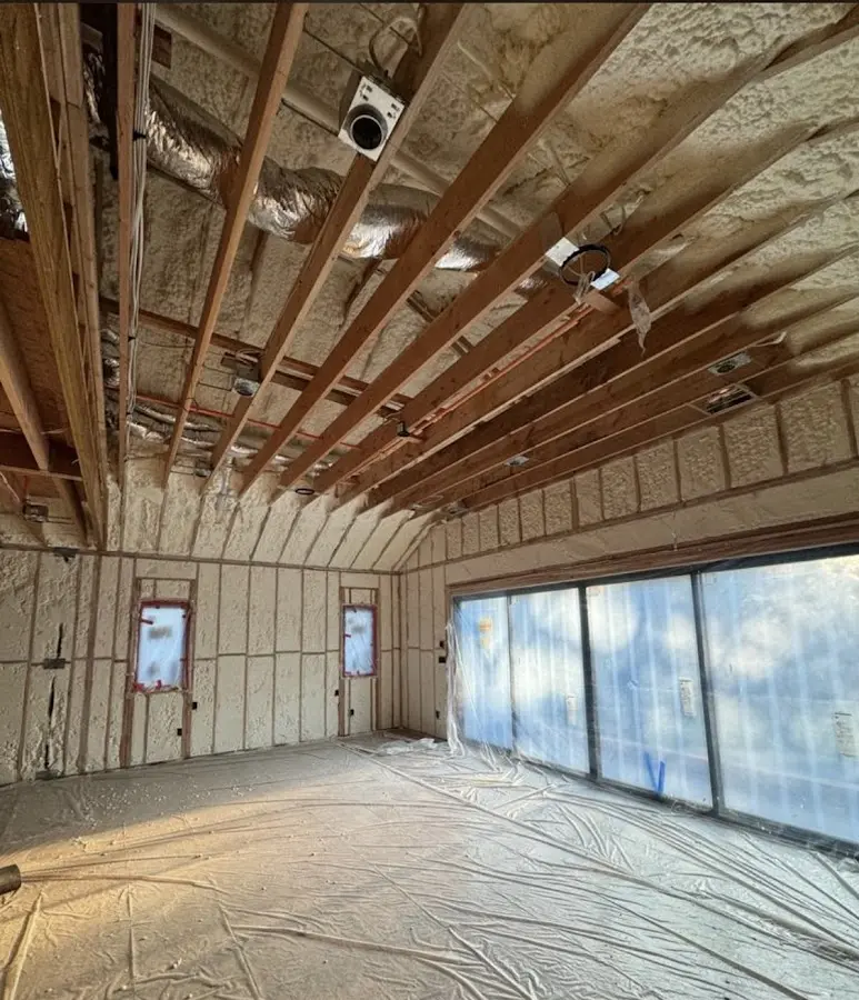 Interior walls and ceiling insulated with spray foam during new construction in Midlothian